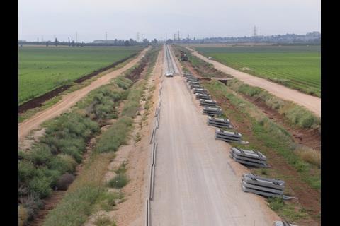 Tracklaying and ballasting are underway on the first stage of ISR’s Valley Line running east from Haifa, which follows a former Hedjaz Railway alignment. Photos: Lesico